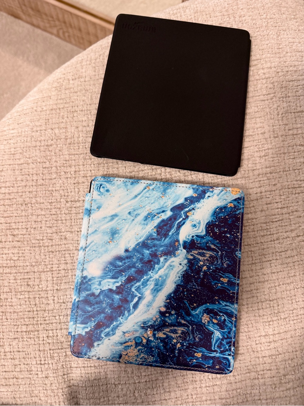 Two Kindle Oasis protective covers